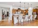 Modern kitchen with granite countertops, stainless steel appliances, and custom cabinetry at 7587 W Quail Ave, Glendale, AZ 85308