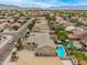 Property includes a private pool, well-manicured landscaping, and a desert-style yard at 8214 S 48Th Dr, Laveen, AZ 85339