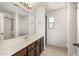 Bathroom features a vanity, storage cabinets, and a shower at 8214 S 48Th Dr, Laveen, AZ 85339