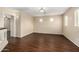 Bright bonus room featuring wood floors, natural light from the windows, and a ceiling fan at 8214 S 48Th Dr, Laveen, AZ 85339