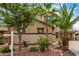 Close up of a two-story home featuring manicured landscaping and a welcoming entryway at 8214 S 48Th Dr, Laveen, AZ 85339