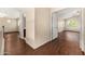 Hallway with hardwood floors and doors at 8214 S 48Th Dr, Laveen, AZ 85339