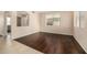 Living room featuring a neutral paint color, and hard wood flooring at 8214 S 48Th Dr, Laveen, AZ 85339