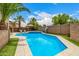 Inviting backyard pool with spa and travertine pavers at 8214 S 48Th Dr, Laveen, AZ 85339