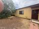 The front yard is nicely landscaped and features a walkway leading to the front door at 9054 E Crescent Ave, Mesa, AZ 85208