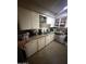 Bright kitchen with stainless steel appliances and ample counter space at 9054 E Crescent Ave, Mesa, AZ 85208