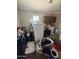 This laundry room has side-by-side washer and dryer units at 9054 E Crescent Ave, Mesa, AZ 85208