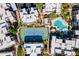 Aerial view of the community tennis court, community pool, and neighborhood buildings at 11260 N 92Nd St # 2111, Scottsdale, AZ 85260