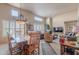 Open-concept living area with abundant natural light, a ceiling fan, and comfortable furnishings at 11260 N 92Nd St # 2111, Scottsdale, AZ 85260
