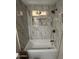 Bright bathroom featuring marble walls and a new bathtub at 1149 S 98Th St, Mesa, AZ 85208