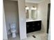 Bathroom featuring double vanity, gold hardware, and tile flooring at 1149 S 98Th St, Mesa, AZ 85208