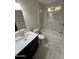 Bright bathroom with modern vanity, sink, and white marble backsplash at 1149 S 98Th St, Mesa, AZ 85208