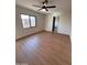 Bedroom with wood flooring and ceiling fan at 1149 S 98Th St, Mesa, AZ 85208