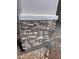 Stone facade on column accent base of home exterior showing color and texture at 1171 E Peach Tree Dr, Chandler, AZ 85249