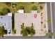 Aerial view showcases the property's roof, landscaping, and convenient location at 13055 W Tangelo Dr, Sun City West, AZ 85375
