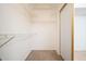 Walk-in closet features ample shelving and sliding doors, providing organized storage space at 13055 W Tangelo Dr, Sun City West, AZ 85375
