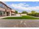 Large backyard with gravel, turf, and view of exterior patio with home at 13367 W Jesse Red Dr, Peoria, AZ 85383