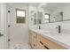 Bathroom featuring double sinks and marble floors at 13367 W Jesse Red Dr, Peoria, AZ 85383