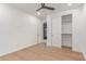 Bedroom with hardwood floors and walk-in closet at 13367 W Jesse Red Dr, Peoria, AZ 85383