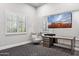 Bedroom with modern desk, an armchair, and a mounted TV with a beautiful view at 13750 E Yucca St, Scottsdale, AZ 85259
