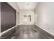 Spacious bedroom with tile floors, plantation shutters, and modern design at 13850 W Weaver Ct, Litchfield Park, AZ 85340