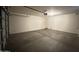 Spacious two car garage with ample space for storage and parking at 13921 W Port Royale Ln, Surprise, AZ 85379