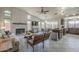 Open concept living room, kitchen, and dining space with ample natural light at 1461 W Tara Dr, Gilbert, AZ 85233