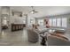 Spacious living room with tile flooring, white walls, and natural light at 1461 W Tara Dr, Gilbert, AZ 85233