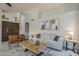 Comfortable living room with modern decor, neutral colors, and ample seating at 1461 W Tara Dr, Gilbert, AZ 85233