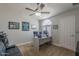 Well-lit office boasts a vaulted ceiling, neutral colors, and modern shutters at 1461 W Tara Dr, Gilbert, AZ 85233