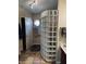 Bathroom showcasing a unique glass block shower wall and neutral tile flooring at 14617 S 35Th Pl, Phoenix, AZ 85044
