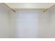 A closet with white walls and shelving, ready to be filled at 14881 W Ashland Ave, Goodyear, AZ 85395