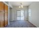 Dining room with sliding glass door to patio providing ample natural light at 14881 W Ashland Ave, Goodyear, AZ 85395