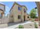 Beautiful stucco two-story home boasts a low-maintenance yard and charming architecture at 14881 W Ashland Ave, Goodyear, AZ 85395