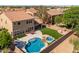 Aerial view of pool, spa, patio, and landscaping at 16206 W Cocopah St, Goodyear, AZ 85338