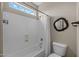 Clean, well-lit bathroom featuring a shower/tub combo and neutral decor at 16206 W Cocopah St, Goodyear, AZ 85338