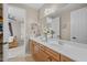 Bright bathroom with dual sinks and white countertops at 16206 W Cocopah St, Goodyear, AZ 85338