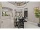 Beautiful dining area with designer lighting and seamless flow to living spaces at 16206 W Cocopah St, Goodyear, AZ 85338