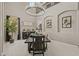 Elegant dining room with modern chandelier and decor at 16206 W Cocopah St, Goodyear, AZ 85338