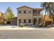 Charming two-story home featuring a welcoming porch, desert landscaping, and neutral color palette at 16206 W Cocopah St, Goodyear, AZ 85338