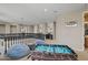 Cozy loft with foosball table and beanbags, offering a comfortable space for relaxation and entertainment at 16206 W Cocopah St, Goodyear, AZ 85338