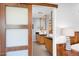 This primary bathroom boasts double vanities, sleek countertops, modern fixtures, and elegant mirrors at 1702 E Staghorn Ln, Carefree, AZ 85377