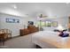 Relaxing main bedroom featuring neutral colors, comfortable furnishings, and a scenic window view at 1702 E Staghorn Ln, Carefree, AZ 85377