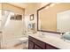 Cozy bathroom with a single sink vanity, neutral paint, and a shower and tub combo at 17651 N Coconino Dr, Surprise, AZ 85374