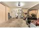 Bright garage with overhead lighting, a door to the home, and plenty of open space at 17651 N Coconino Dr, Surprise, AZ 85374