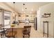 Bright kitchen featuring granite countertops, a breakfast bar, stainless steel appliances, and ample cabinet space at 17651 N Coconino Dr, Surprise, AZ 85374