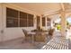 Cozy outdoor patio with decorative features, comfortable seating, and a covered pergola at 17651 N Coconino Dr, Surprise, AZ 85374