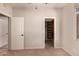 Bedroom featuring neutral walls, carpeted floors, and window with backyard view at 1811 S Brentwood Pl, Chandler, AZ 85286