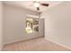 Bright bedroom with large window providing natural light at 1811 S Brentwood Pl, Chandler, AZ 85286