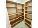 Walk-in closet featuring built-in shelves providing ample storage space at 1811 S Brentwood Pl, Chandler, AZ 85286